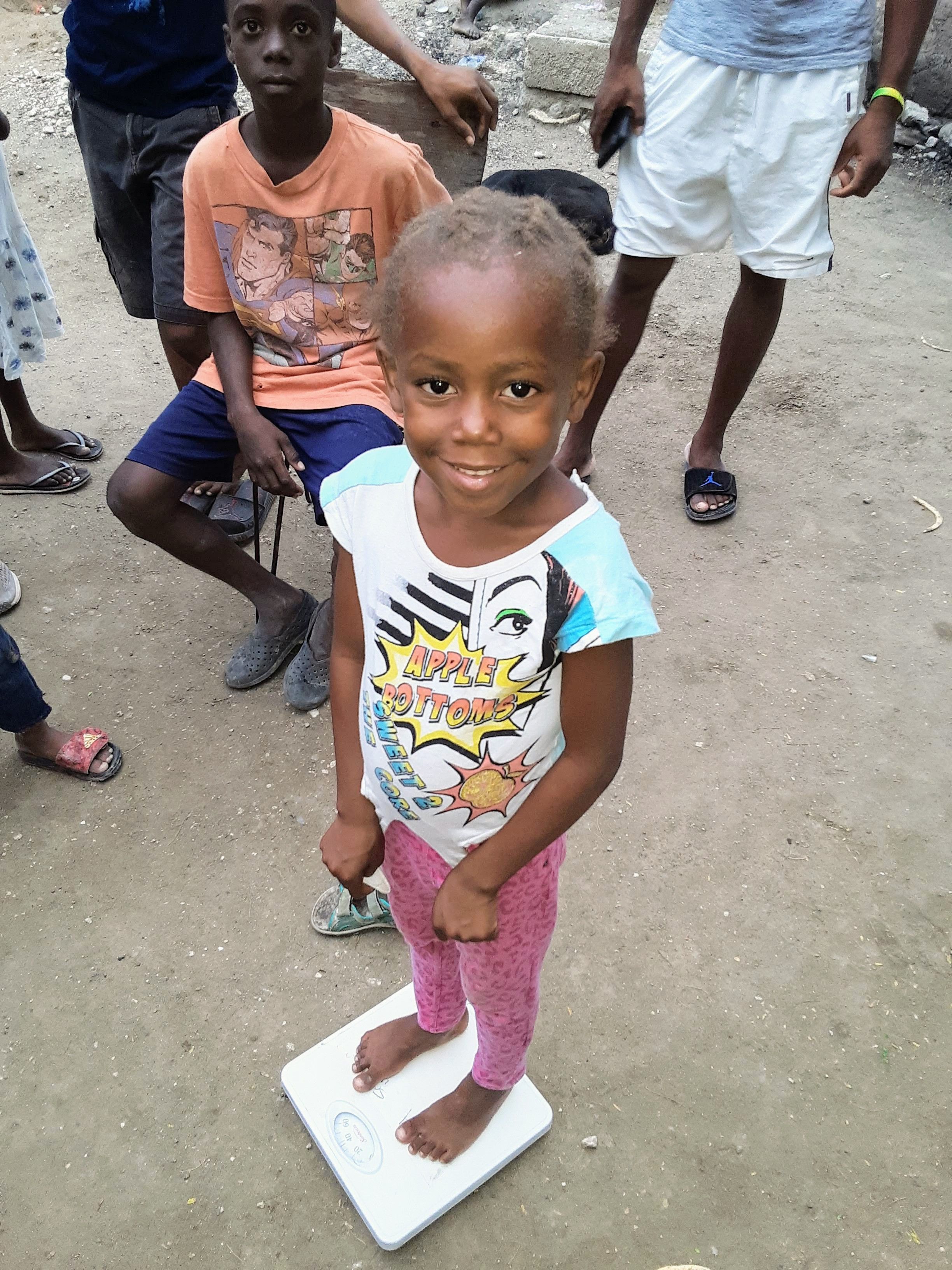 Little one with light-brown hair from malnourishment